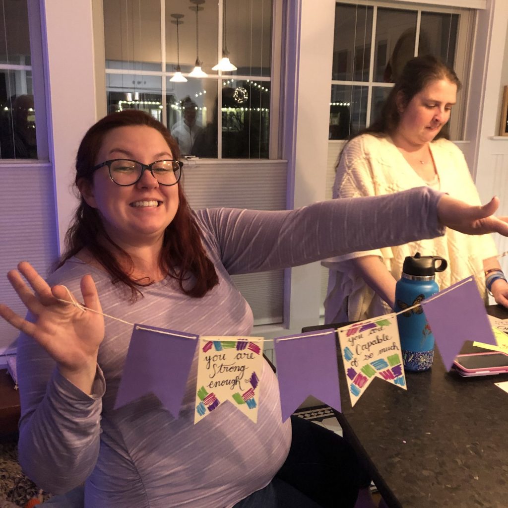 Parent creating a affirmation banner